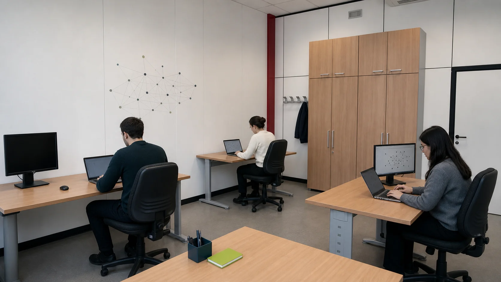 AI-assisted view of room T35 with three generated researchers working at separate tidy desks